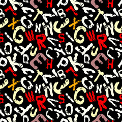 Fototapeta na wymiar graffiti colored letters on a black background grunge texture seamless background