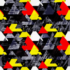 Graffiti small colored polygons on a black background grunge texture seamless pattern