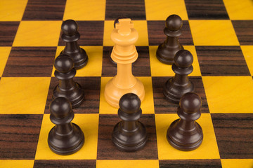 Pawns surrounding king