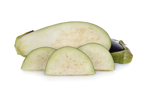 half cut and sliced eggplant on white background