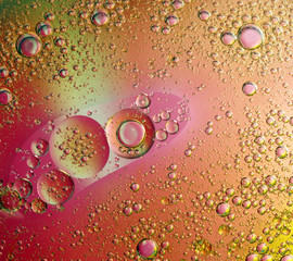 Pink oil in water abstract background.