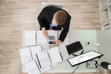 Businessman Checking Tax