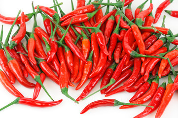 red spicy peppers isolated on white background