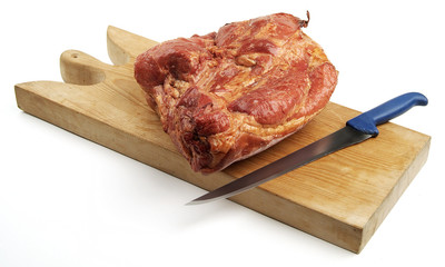 Roasted bacon smoked Tyrolean speck on cutting board