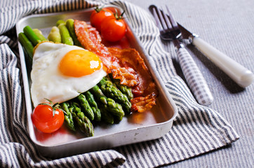 Green asparagus with fried eggs