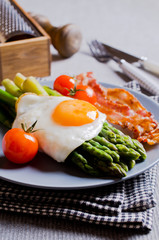 Green asparagus with fried eggs