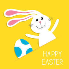 Happy Easter. Bunny rabbit hareand blue painted egg in the paper pocket. Baby greeting card. Yellow background. Flat design.
