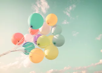 Poster Multicolor balloons in summer holidays. Pastel color filter © jakkapan