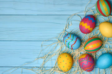 Easter eggs hand painted colorful, wood background