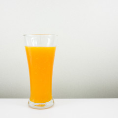The glass of tasty pure orange juice for a good healthy.