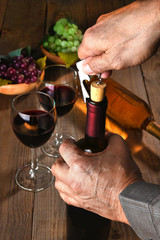 Man Opening Wine Bottle