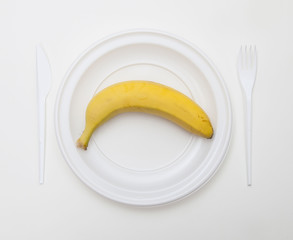 White disposable dishware set Fork, Knife and Banana