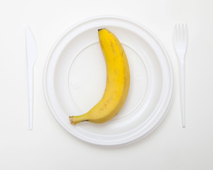 White disposable dishware set Fork, Knife and Banana