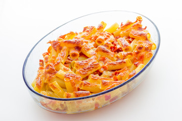 Baked macaroni cheese with tomatoes and sausage