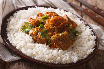 madras beef with garnish basmati rice close-up on a plate. horizontal
 - obrazy, fototapety, plakaty