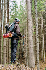 Fototapeta premium caucasian male hiking in mountains