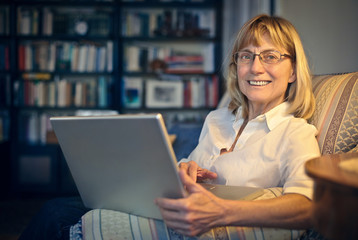 Happy woman using technology