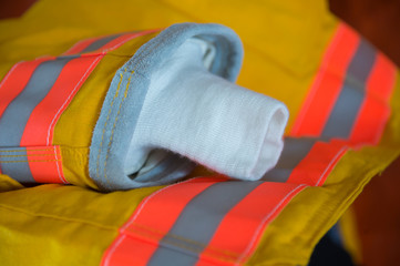 Empty firefighter's boots, helmet and uniform