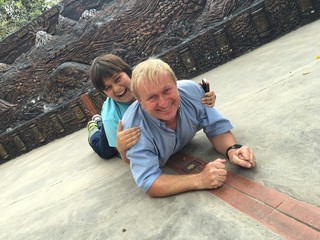 A father and son having fun on the equator