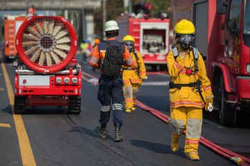 firefighter training with oxygen mask suit walk beside the anti anti bio hazard machine