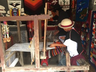 A young textile weaver in Ecuador