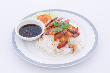 serving of rice with roasted pork on top