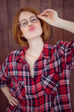 beautiful hipster woman pouting at the camera