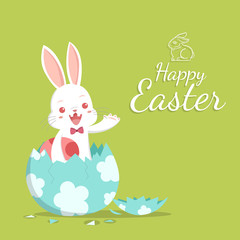 Easter bunny holding little egg in the broken egg