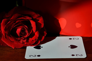 Due picche - rosa rossa
