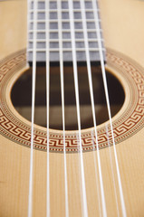 Obraz premium Closeup of strings of a classical acoustic guitar (shallow DOF)
