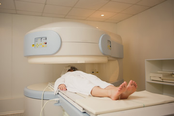 Patient being scanned and diagnosed on a computed tomography