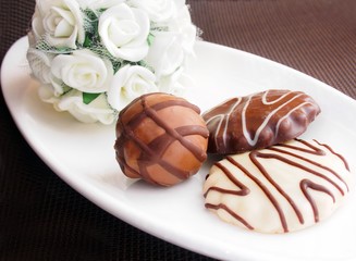 Sweet breakfast, yoghurt with wild berries and chocolate cookies