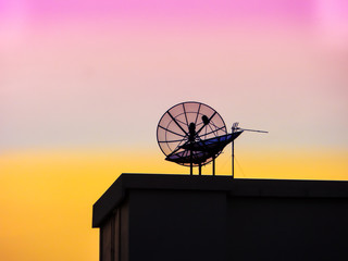 satellite in the purple and orange sky