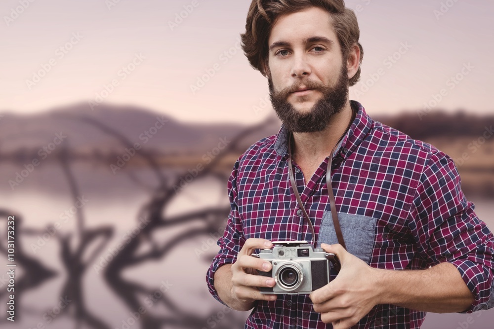 Poster composite image of portrait of confident hipster using camera
