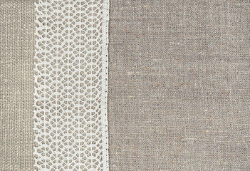 Vintage background with rude fabric and lace on burlap