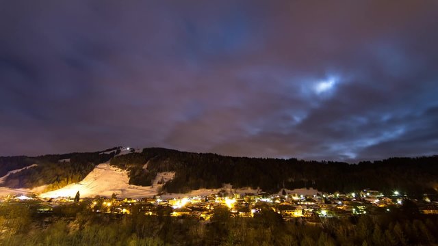 Beautiful full HD time lapse during the night looking over the town of Morzine, France, in March 2013