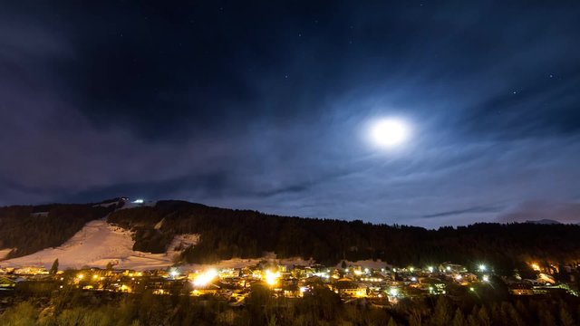 Beautiful full HD time lapse during the night looking over the town of Morzine, France, in March 2013