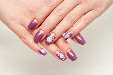 Purple manicure with roses