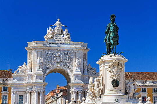 Beautiful image of the gate and statue of  King Jose on the Commerce square (Praca do Comercio) in Lisbon, Portugal