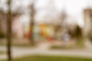blurred background of small town in spring 