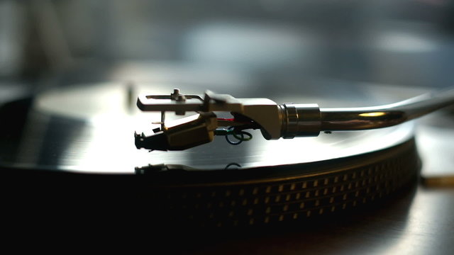 Turntable with spinning vinyl records