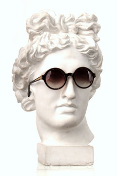 plaster white bust of Appolon in stylish round points