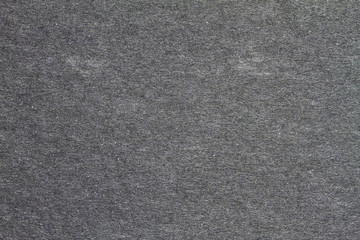 Black paper texture background.