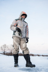 Fototapeta na wymiar Winter fishing on the ice