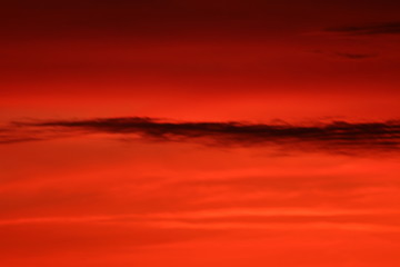 Reddish and cloudy sky at sunset in Bregenz, Austria