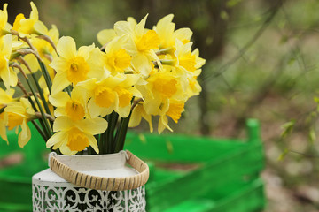  Spring flowers in pots in the garden. Easter decoration with sp