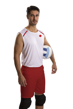 Professional Canadian Volleyball player with ball.