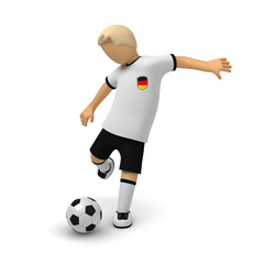 Deutsche Fußballer kickt den Ball von Boden