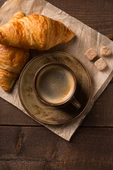 coffee cup and croissant