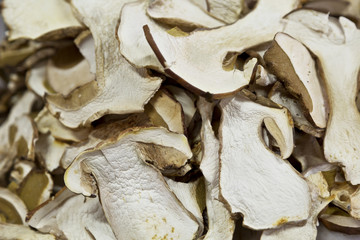 Heap of dried edible mushrooms on the market